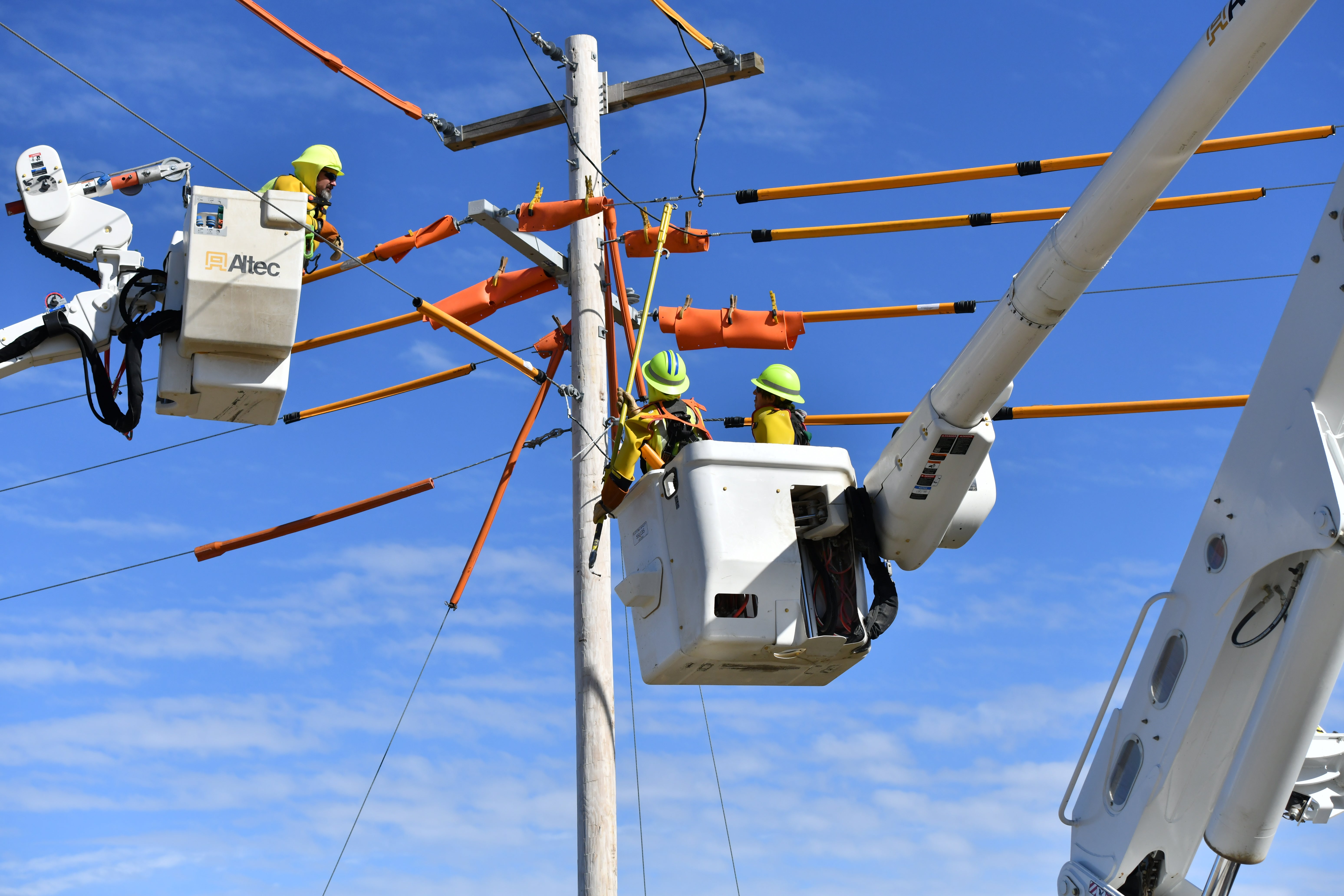Linemen working safe