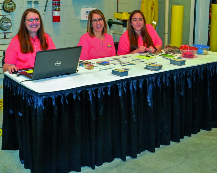 Employees prepare for annual meeting
