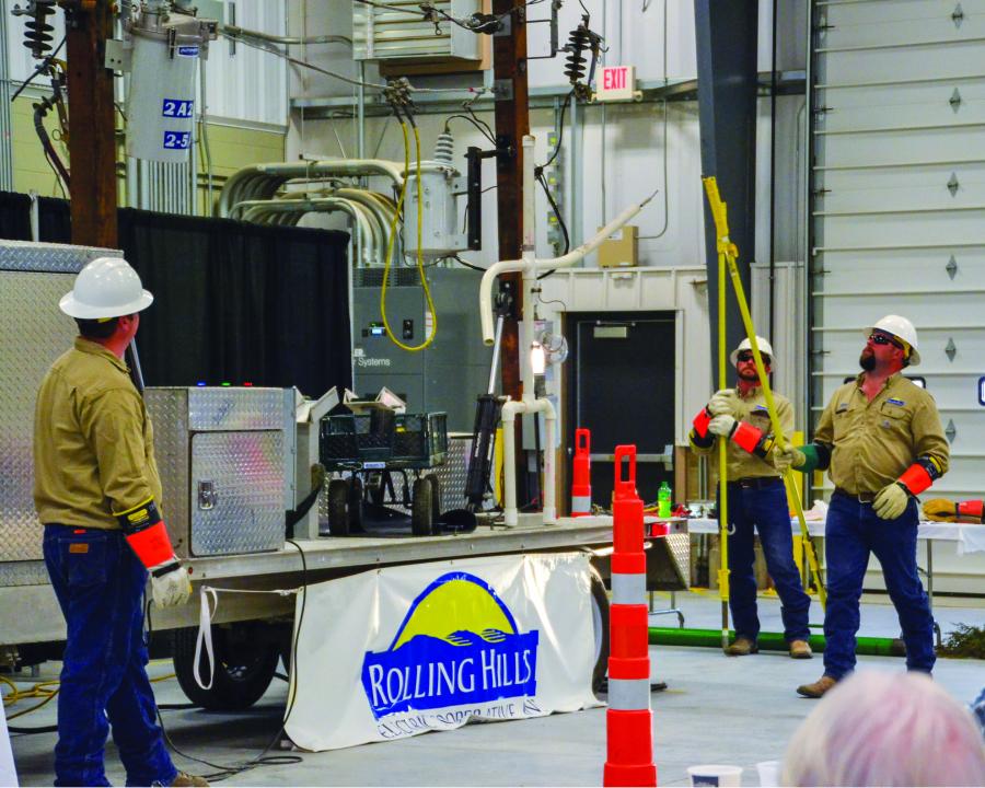 Lineman providing a hot line safety demonstration